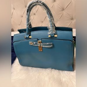 Beautiful Blue Eva Mendez handbag NY&CO New!